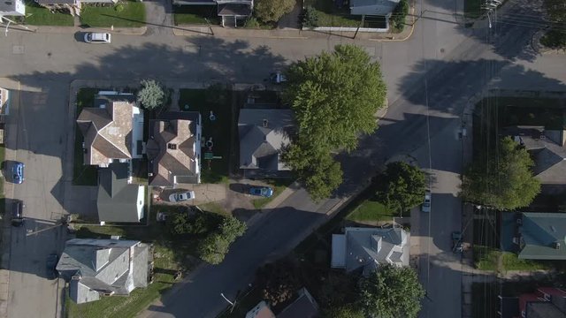A top down bird's eye aerial flyover view of a typical western Pennsylvania residential neighborhood. Pittsburgh suburbs.	 	