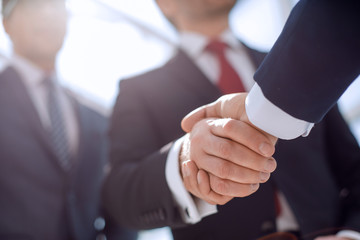 close up.handshake business partners