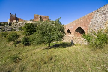 Fototapeta premium Hammershus castle - the biggest Northern Europe castle ruins situated at steep granite cliff on the Baltic Sea coast, Bornholm, Denmark