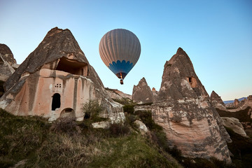 Fototapeta na wymiar Mountain landscape with large balloons in a short summer season at dawn.
