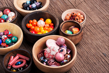 Fashion beads in wooden bowls