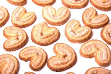 Obraz na płótnie Canvas Sweet cookie hearts isolated on white background