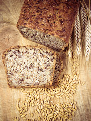 Multi-grain bread on a wooden background. Healthy food concept.