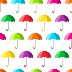 Geometric seamless pattern with colorful open umbrellas isolated on white background. Vector illustration