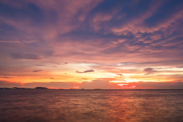 Twilight sky background. Colorful Sunset sky and cloud.vivid sky in twilight time background.Fiery orange sunset sky. Beautiful