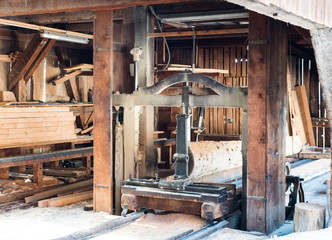 A view of the interior of an old traditional swa mill with old machines and tools