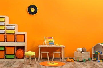Stylish children's room interior with toys and new furniture