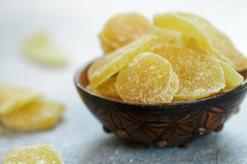 Candied ginger slices. Sweet spicy treat for tea. Prevention of colds. Health