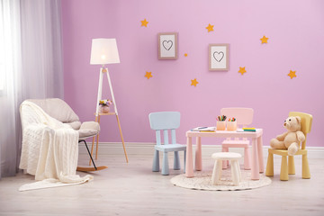 Beautiful child room interior with cute furniture and toys