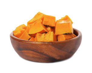 Bowl with fresh raw pumpkin pieces isolated on white