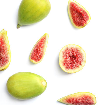Fresh ripe figs on white background, top view. Space for text