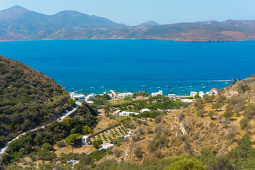 Fototapeta na wymiar View the bay from above where Klima village is located in Milos, Greece