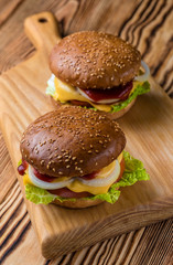 Fishburger on a wooden board