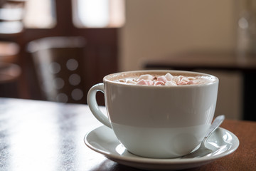 A cup of Hot Chocolate, with Marshmallows on top.