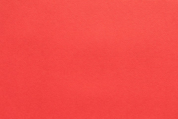 The texture of the cardboard is red. Abstract red background
