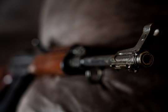 Low key photo of AK-47 Kalashnikov rifle. Dark themed automatic rifle from Russia/Soviet union.