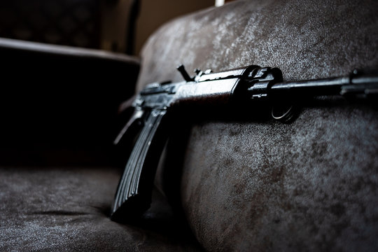 Low key photo of AK-47 Kalashnikov rifle. Dark themed automatic rifle from Russia/Soviet union.