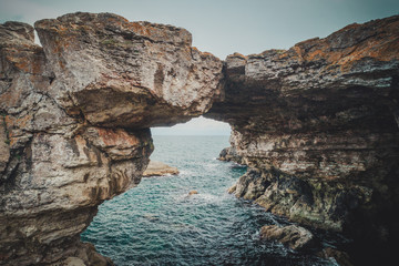 Fototapeta na wymiar The rock formation Arch in the sea near Tyulenovo, Bulgaria, Europe .