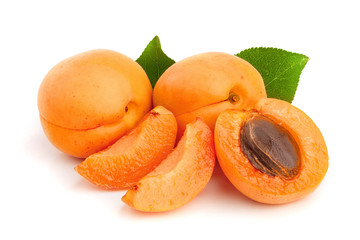 Apricot fruits with leaves isolated on white background macro