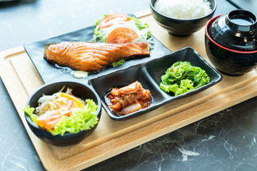 Japanese food mix on a  black stone table.top view composition.