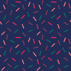Happy sprinkles on dark blue background, seamless repeat pattern. Trendy simplified illustration, suitable for card design, home decor, scrapbooking, wallpapers, wrapping paper, apparel etc.