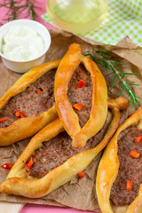 Turkish pizza flatbread pide with ground meat