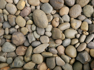Fototapeta na wymiar rock stone in nature,pebbles on the beach