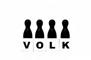 Volk Symbol mit Spielsteinen