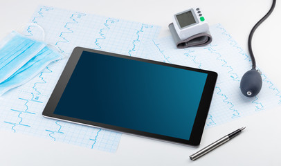 Medicine and modern technology concept with diagnostics concept with free space on tablet screen
