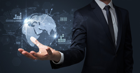 Obraz premium Businessman handing transparent global information flow concept on his hand