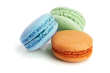 three macaroons isolated on white background closeup