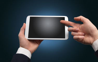 Hand using tablet with no concept and empty space
