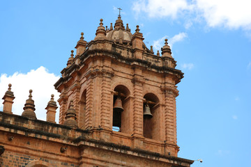 The Belfry of Iglesia de la Compania de Jesus Church against Bright Blue Sky of Cusco, Peru, South America 