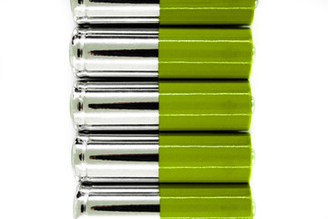 Composition of green and silver batteries placed in line and symbolize green energy, environment...