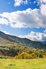 Fototapeta na wymiar mountain landscape with blue sky and white clouds