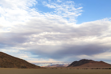Fototapeta na wymiar Low clouds in the desert