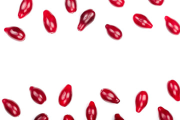 Red berries of cornel or dogwood isolated on white background with copy space for your text. Top view. Flat lay