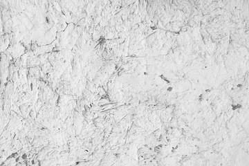 Obraz premium White texture. Background from white wall. Textured surface of clay wall in whitewashing. Light pattern of natural material