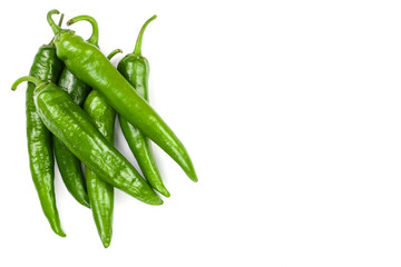green hot chili peppers isolated on white background with copy space for your text. Top view. Flat lay pattern