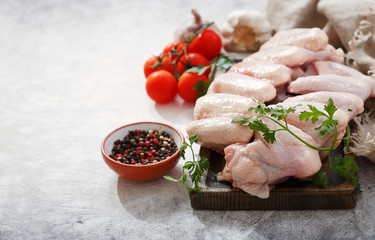fresh chicken wings with ingredients for cooking