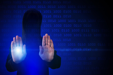 Abstract computer background with hacker in the hood. The flow of energy from the hands of a...