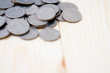 coins on wooden background