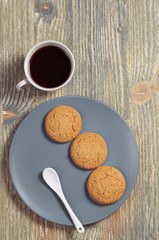 Oatmeal cookies and coffee cup