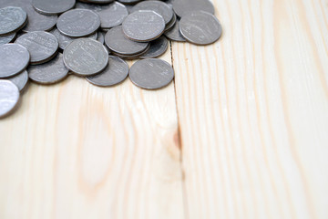 coins on wooden table