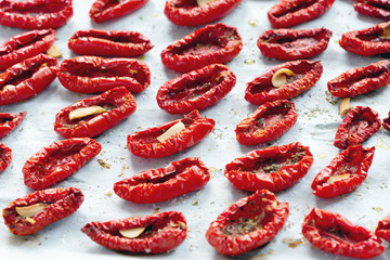 Sun-dried tomatoes with Italian herbs and olive oil.