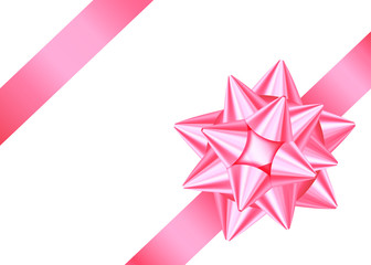 Pink decorative gift ribbon and bow isolated on white background.