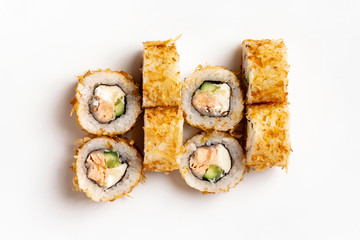 Top view set of sushi rolls with cucumber, cheese and salmon isolated at white background.