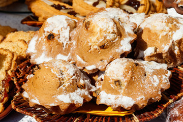 Tasty muffins with raisins and powdered sugar