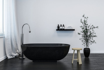interior of modern bathroom with black bathtub - obrazy, fototapety, plakaty