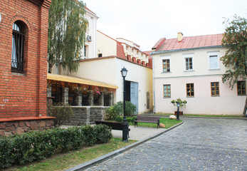 The capital of the Republic of Belarus is the city of Minsk. Trinity Suburb. Cozy patio with flower beds.